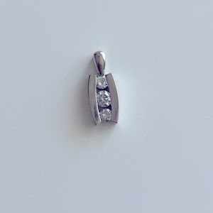 Appraised 14k white gold pendant with diamonds